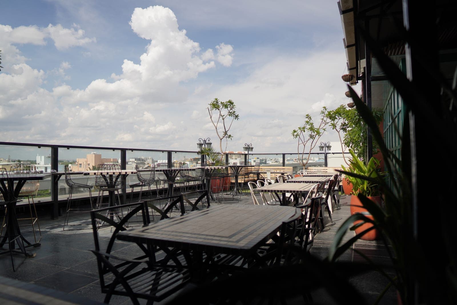 Don't Tell Mama open rooftop terrace with skyline