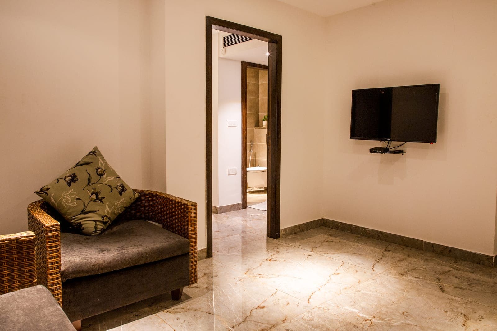 Seating and space in a Suite at The Elite Royale
